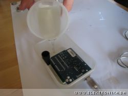 Coating electronics in clear polyester resin